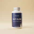 bottle of gut flow with sand colored background